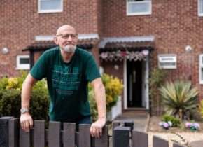 A tenant outside his house